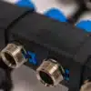 Screw & Lock kunststof vloerverwarming verdeler - close up groepsaansluiting